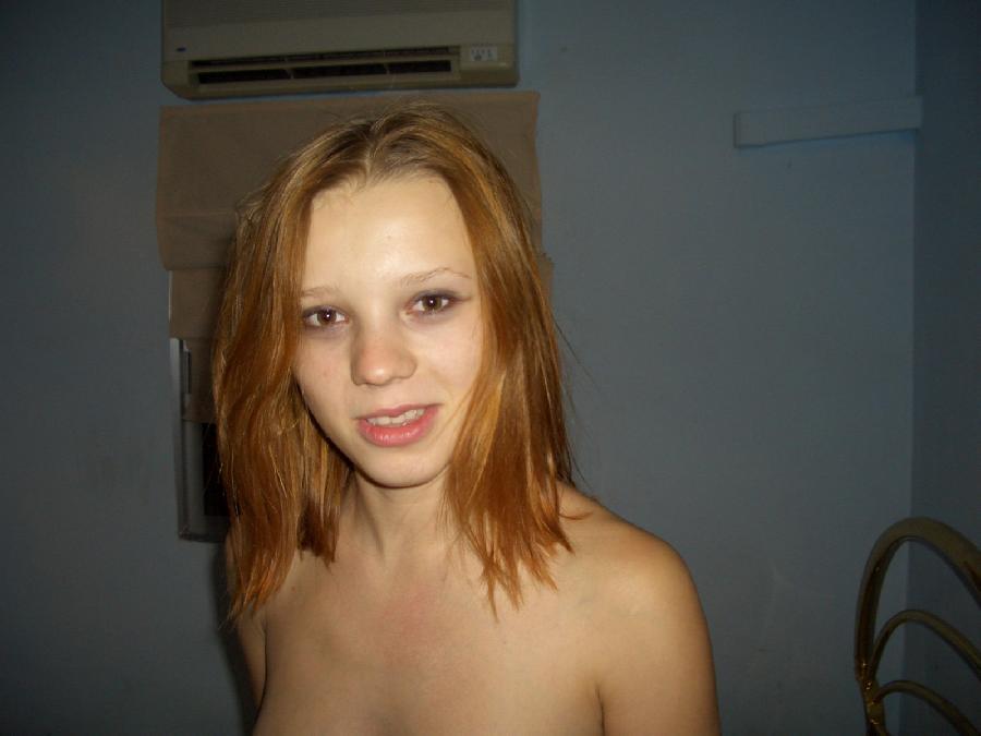 Young red head on a bed - 20