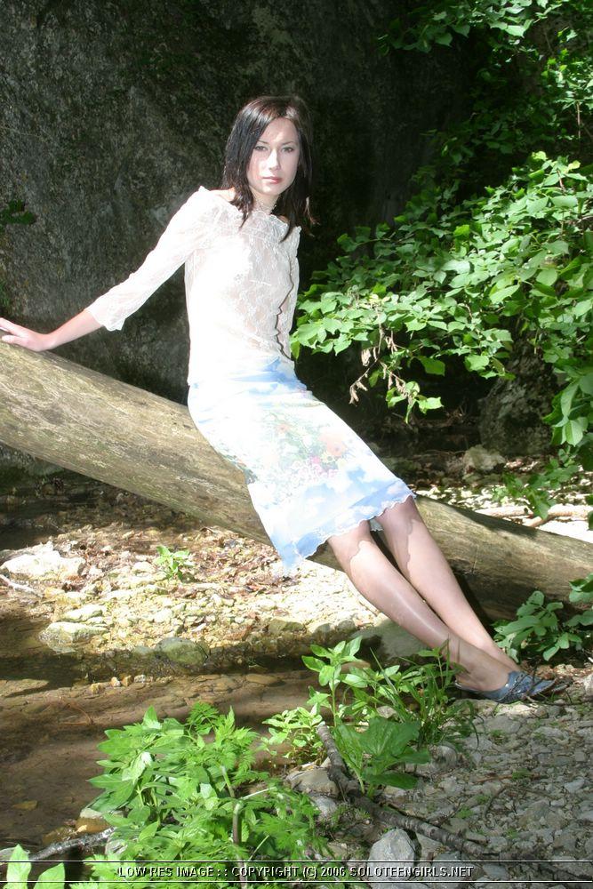 Cute brunette strip in forest - 1