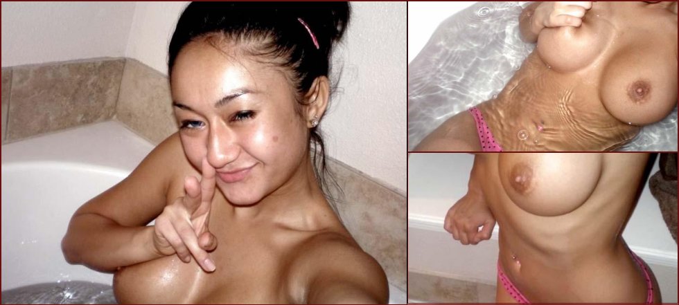 Cute girlie topless in the tub - 32