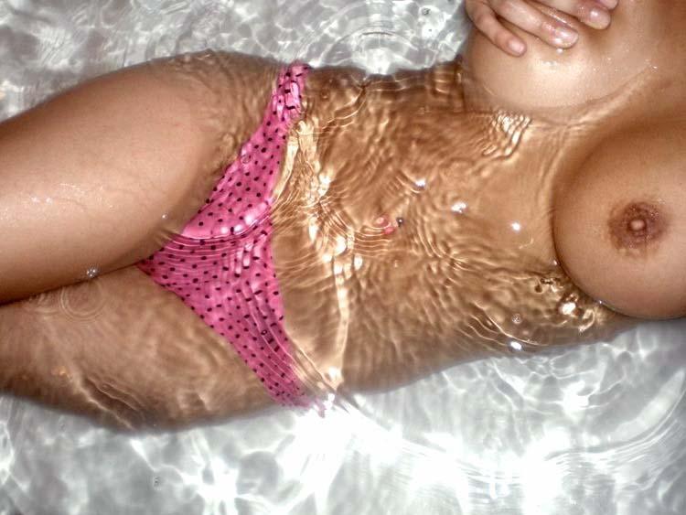 Cute girlie topless in the tub - 4