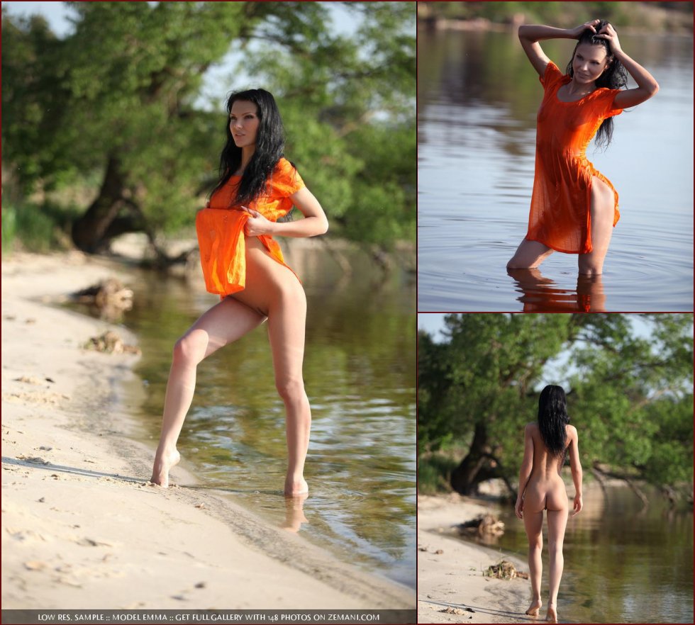 Wet and naked brunette with a slim figure on the beach - Emma - 61