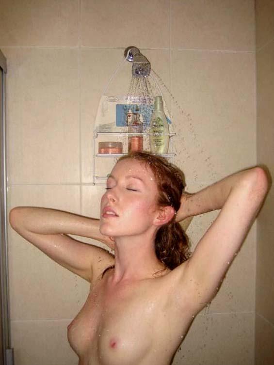Frisky redhead naked in bedroom - 1