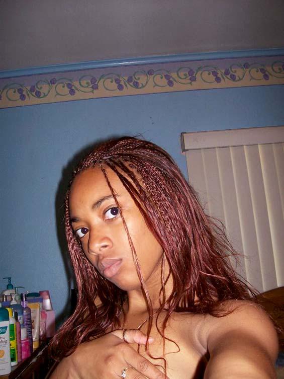 Ebony girl makes gangsta face in nude self pics - 1