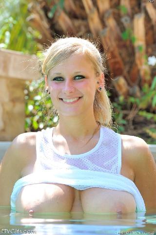 Alice Is Getting All Wet And Slippery In The Pool 12 Pics