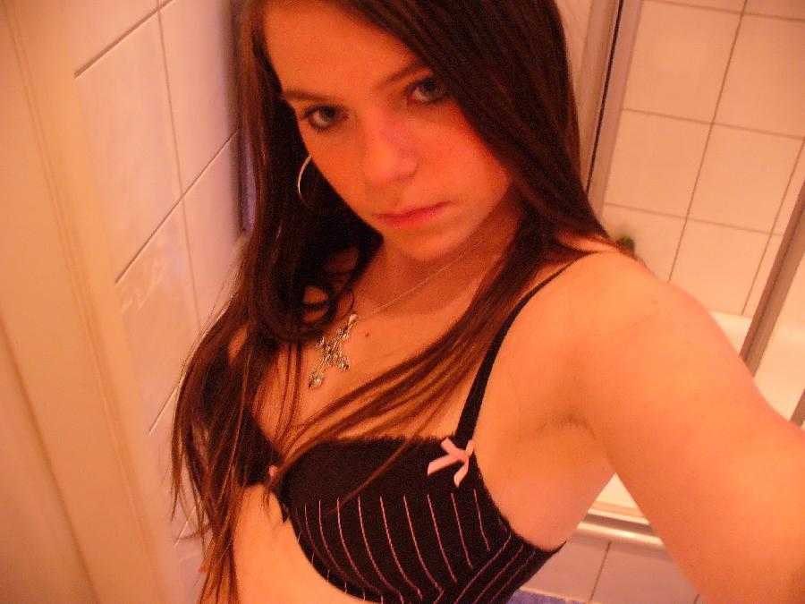 Pretty teen girl in bathroom - 1