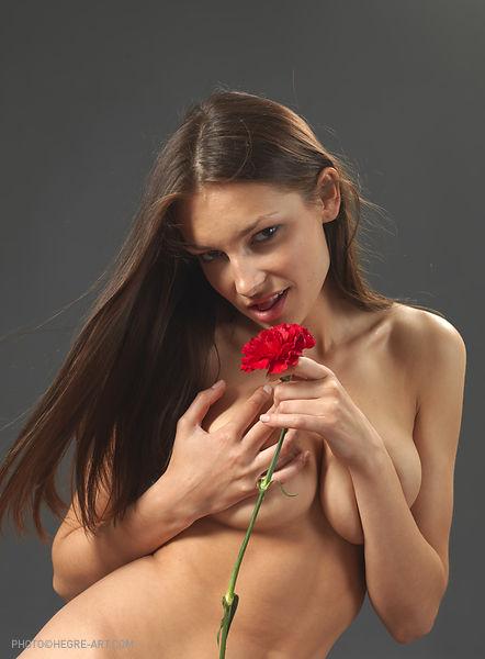 Elvira is posing with red flower - 11