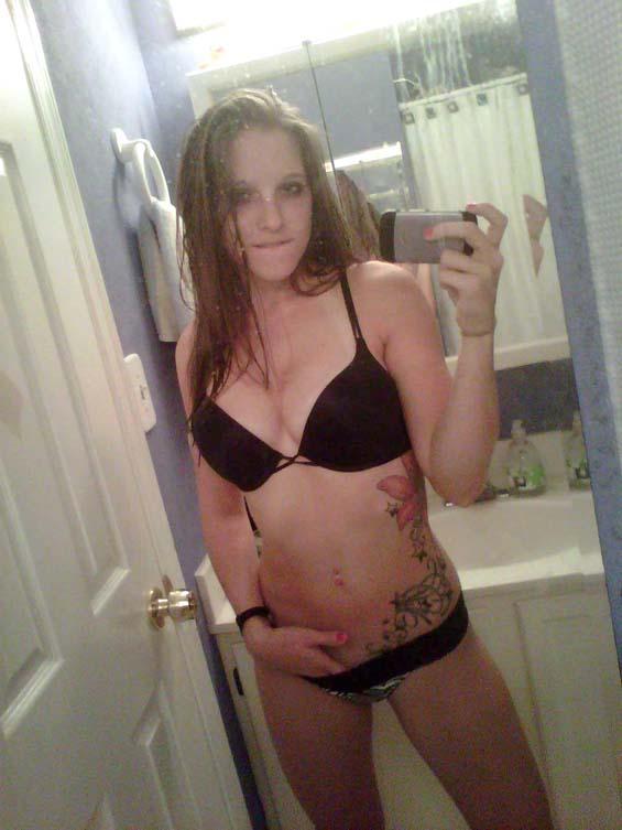 Busty teen with big tattoo - 2