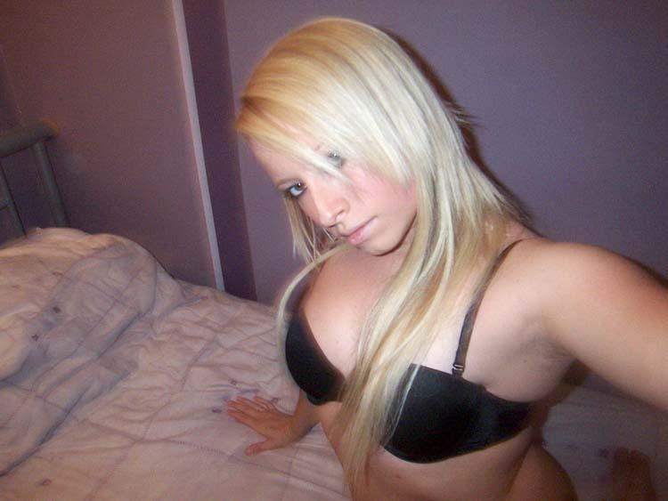 Cute blonde girl in bed - 1