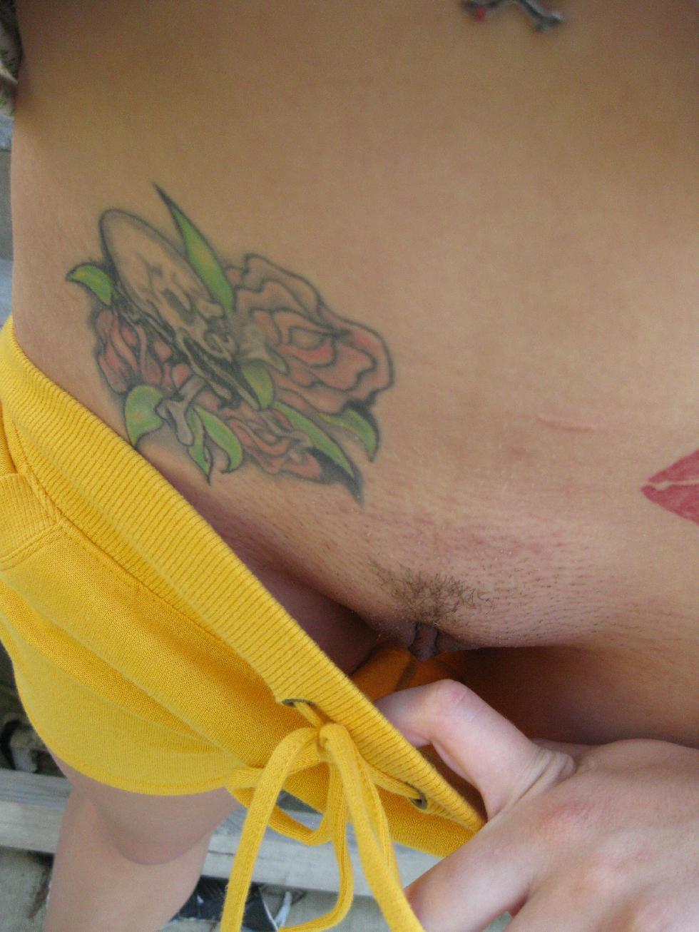 Amateur with tattoos shows boobs and pussy - 11