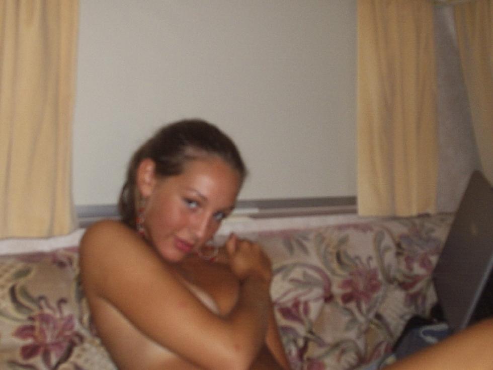 Tanned young girl is posing at home - 11