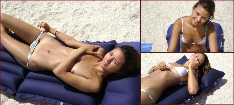 Amateur is lying topless on the beach - 61