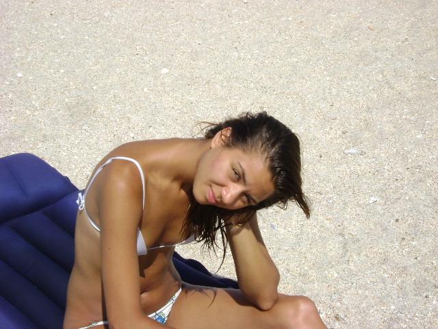 Amateur is lying topless on the beach - 3