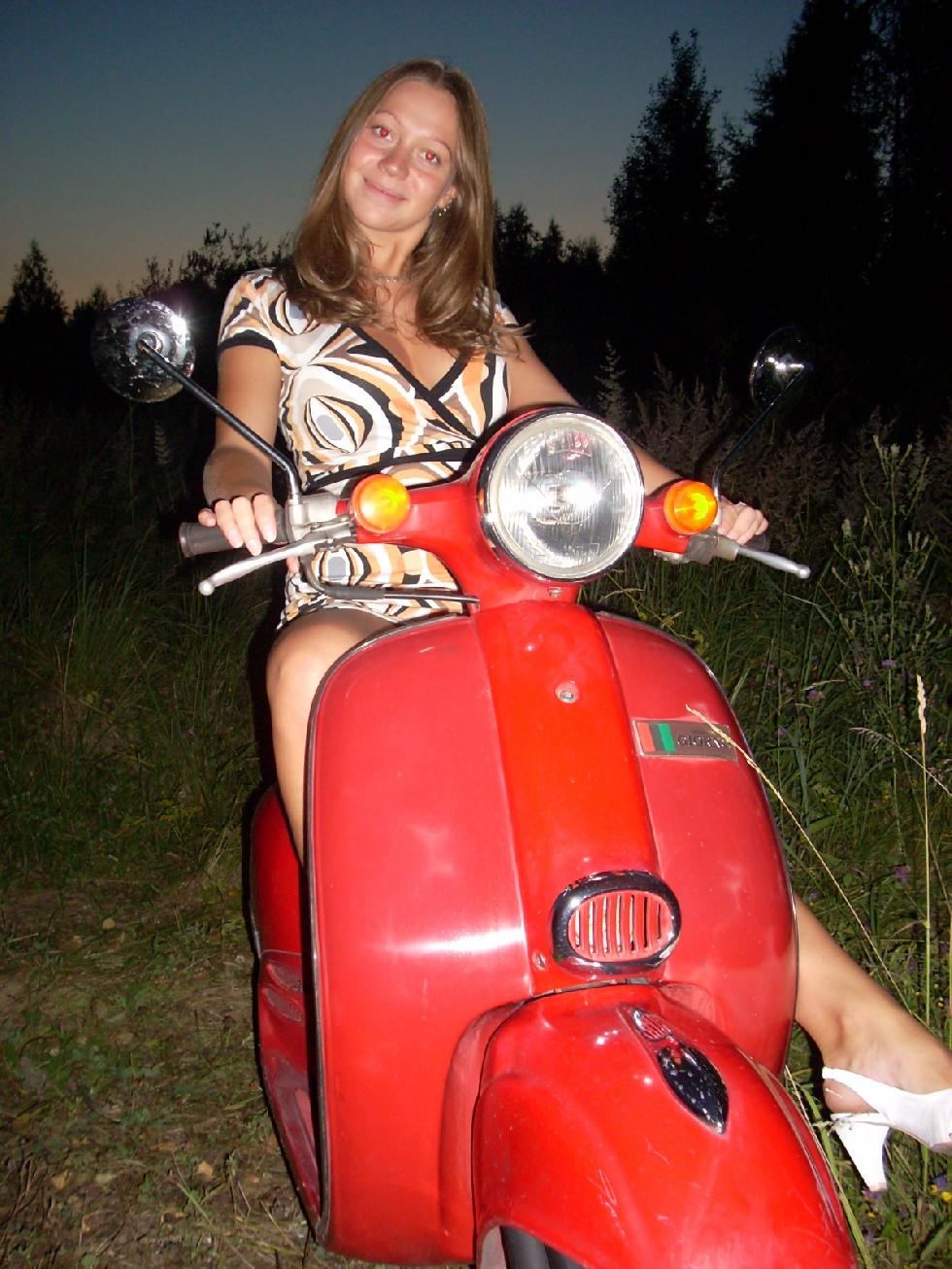 Sexy Vera is posing on an old Vespa  - 1