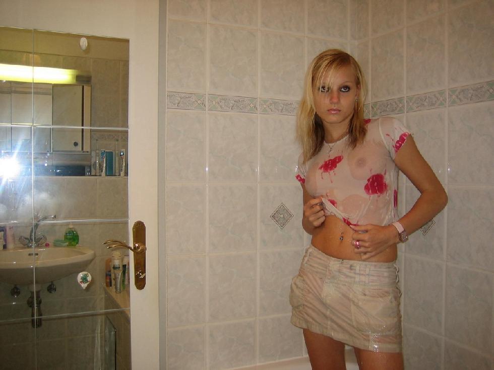 Cute teen girl is taking a shower - 2