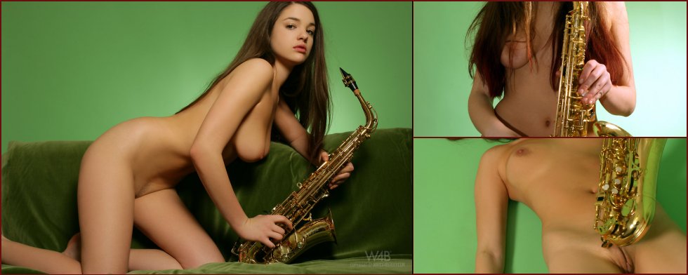 Naked girl plays on saxophone - Olivia - 60