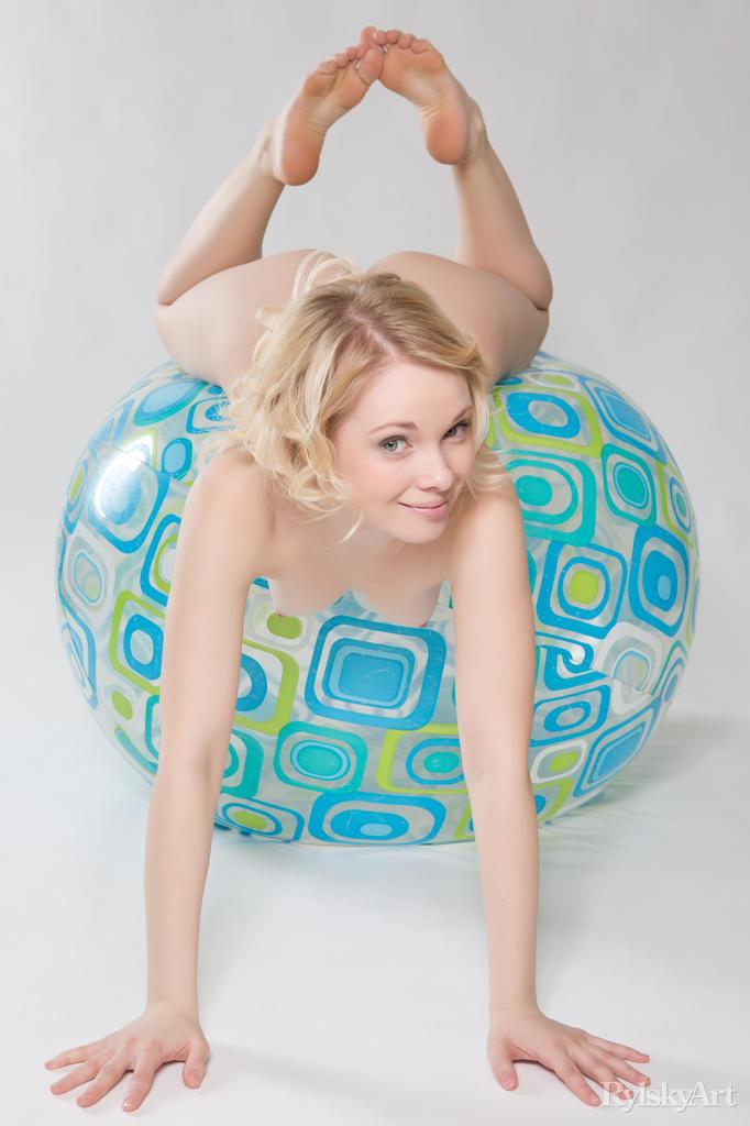 Adorable and naked Feeona is posing with a beach ball - 12