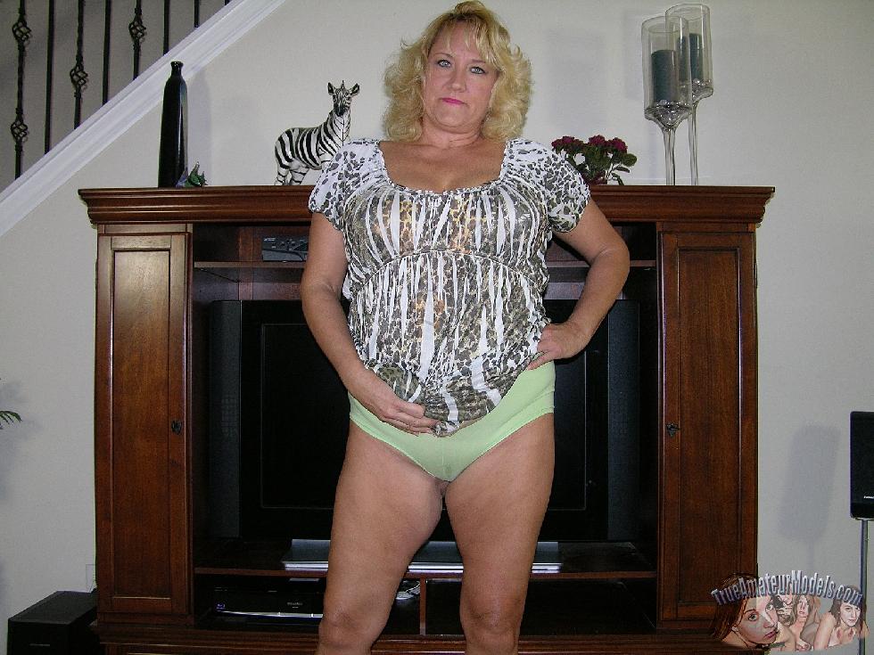 Blonde mature is stripping at home - Katarinna