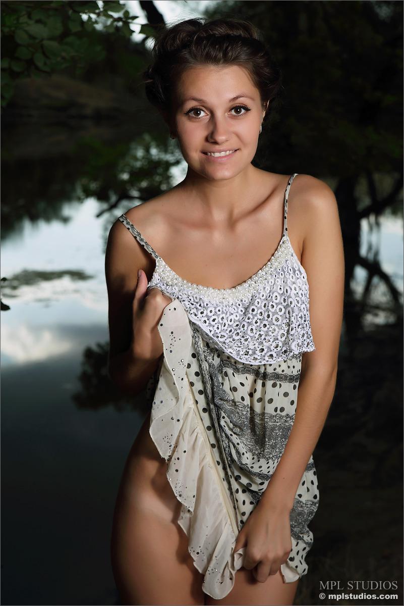 Young Carmela is posing in nature - 2