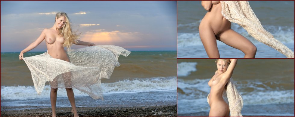 Chloe is posing naked on the beach - 38