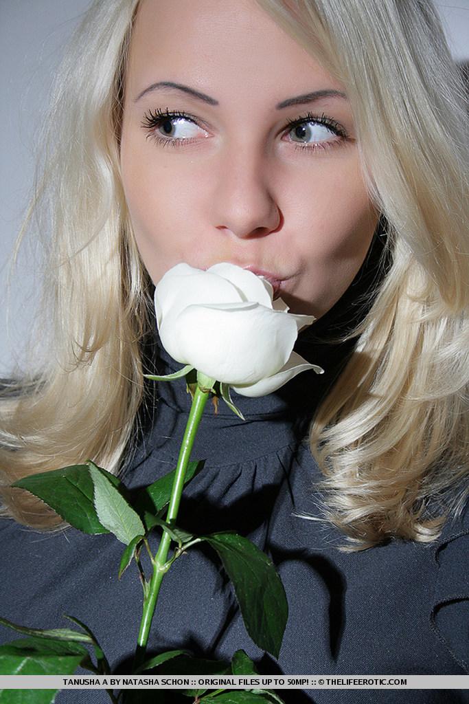 Blonde Tanusha is posing by the wall - 1