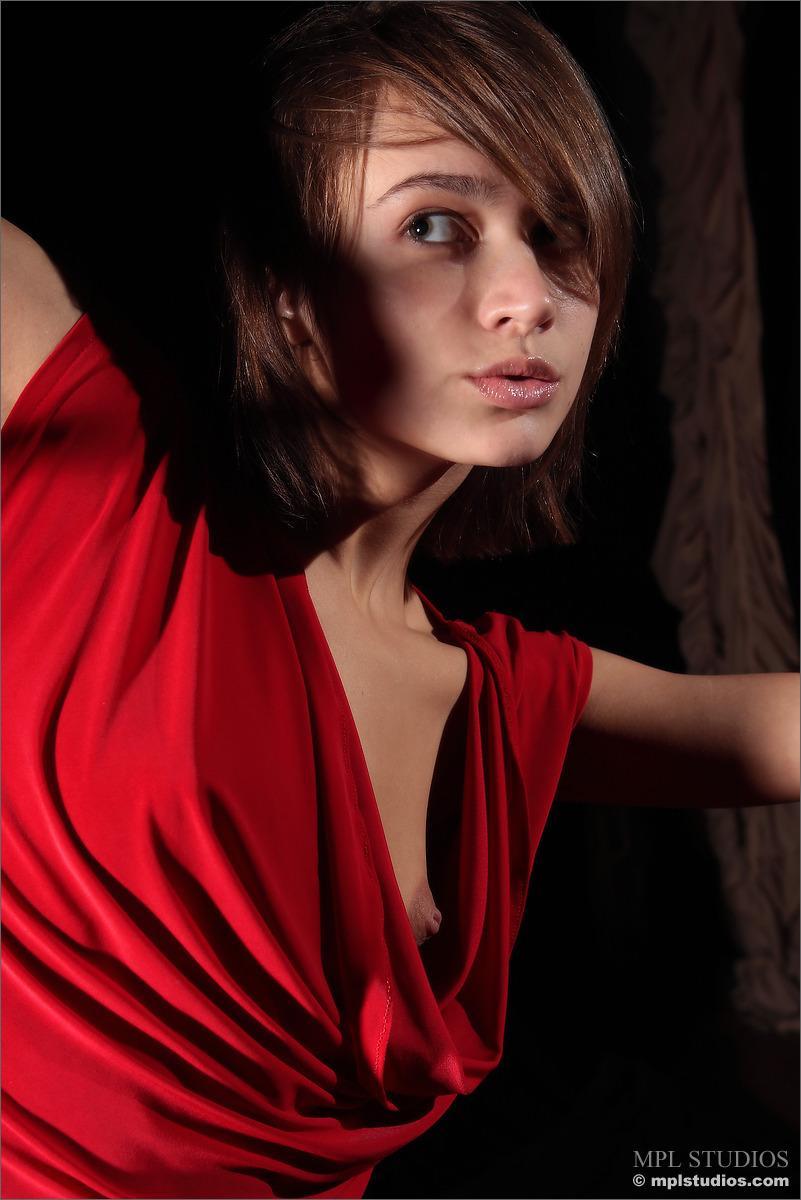 Pretty Lera is posing in red gloves. Part 1 - 2