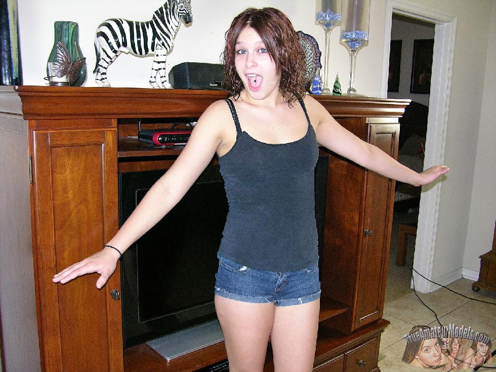 Charming redhead is stripping at home - Abby - 3