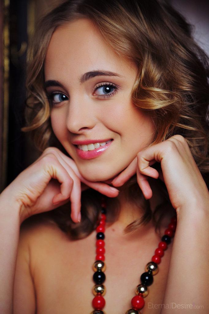 Lovely Rachel Blau is posing with long necklace - 1