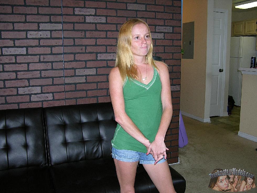 Young Alyssa Hart is posing at home - 1