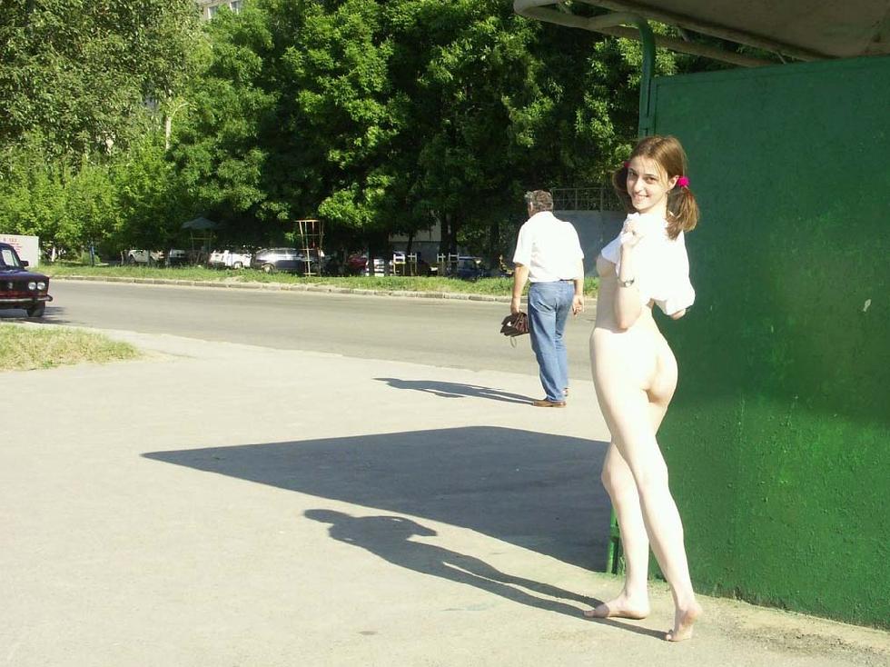 Cute teen is posing naked in public place - 1
