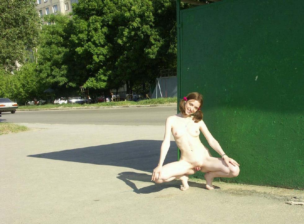 Cute teen is posing naked in public place - 7