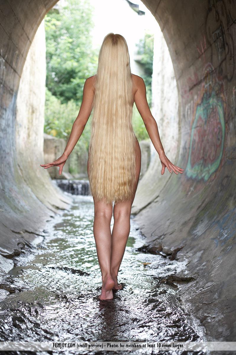 Lovely, naked blonde with very long hair - Desiree