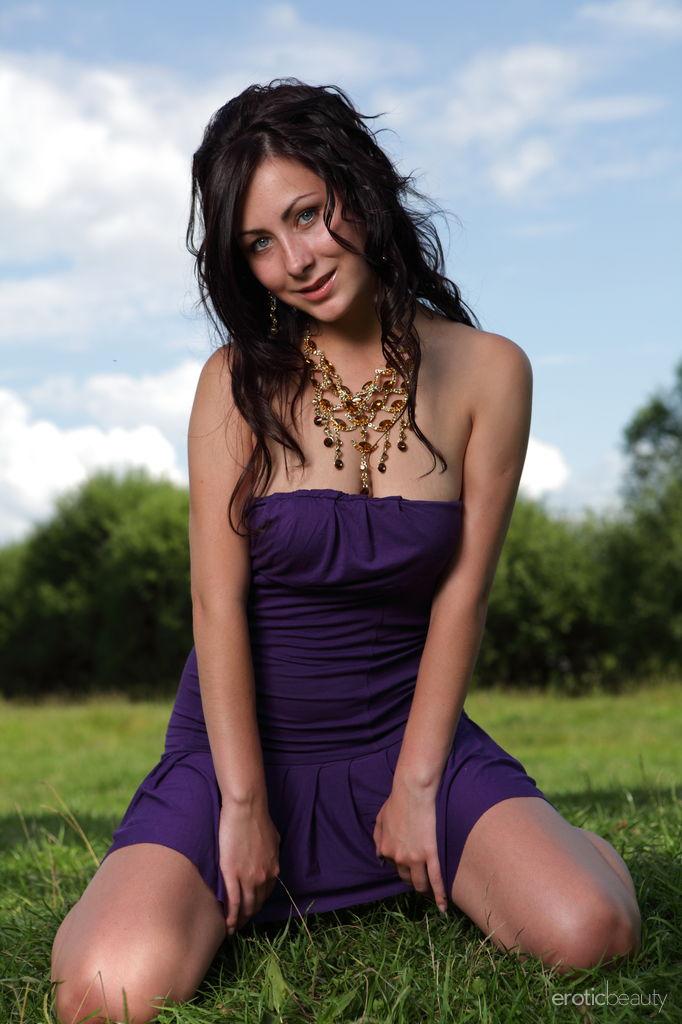 Wonderful brunette is posing on the grass - Madeline - 2