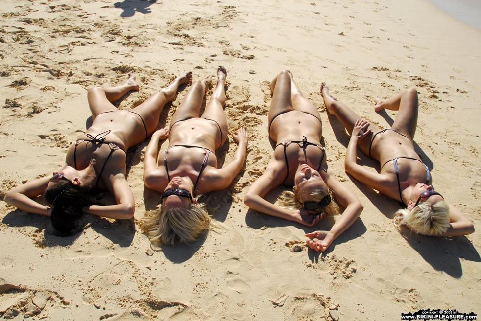 Four girls in sexy micro bikinis - 16