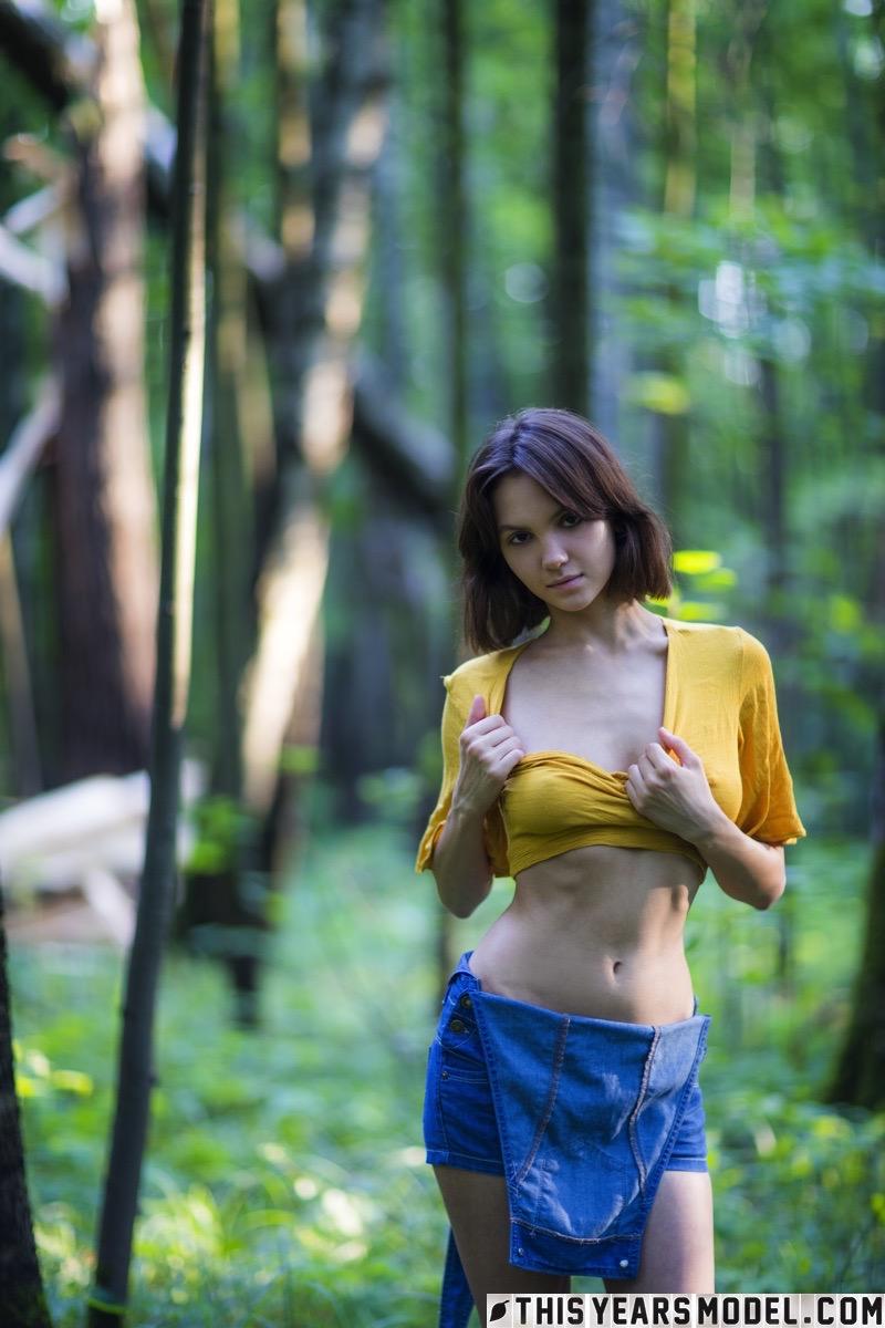 Cute teen girl is stripping in the forest - Lara Masier - 1