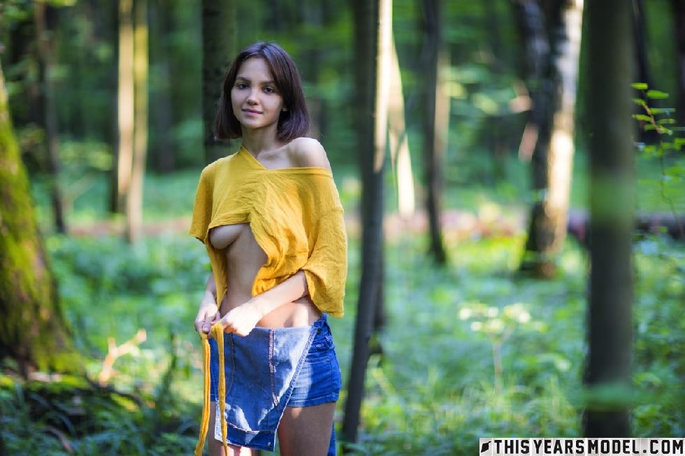 Cute teen girl is stripping in the forest - Lara Masier - 4