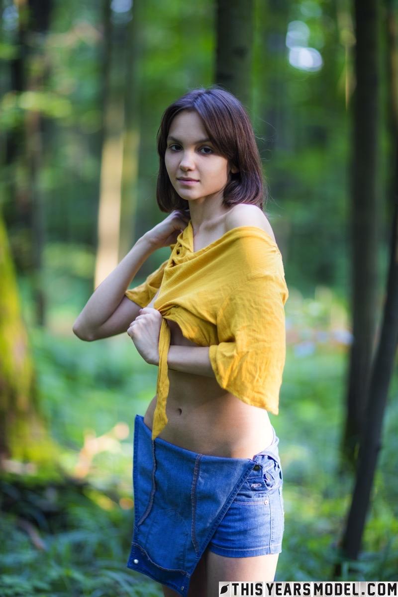 Cute teen girl is stripping in the forest - Lara Masier - 5