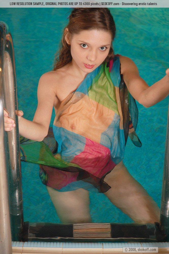 Young redhead in the pool - Irishka - 5