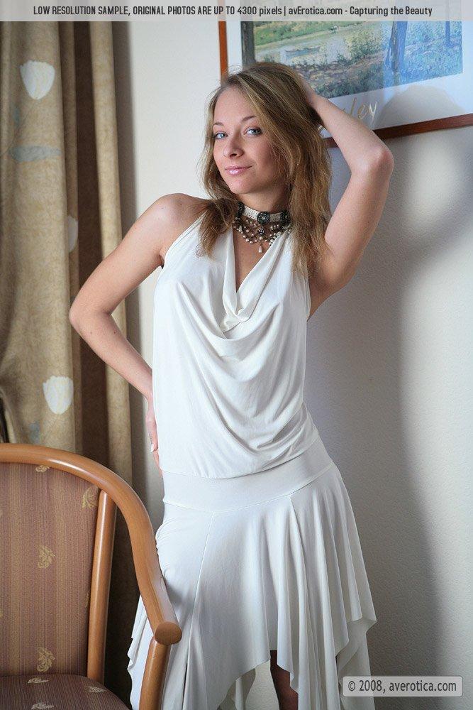 Charming Olivia is posing on the chair - 2