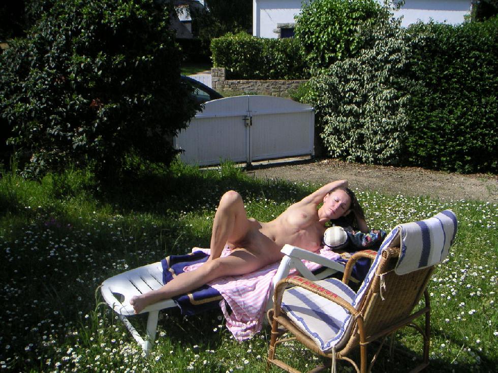 Sexy MILF is taking a sunbath on the backyard - 5
