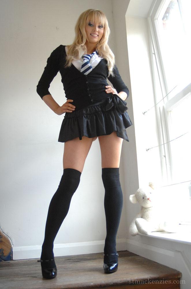 Sexy schoolgirl does hot striptease - Elle - 1