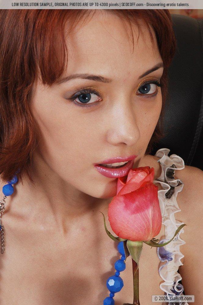 Red-haired Leila is tempting on the sofa - 3