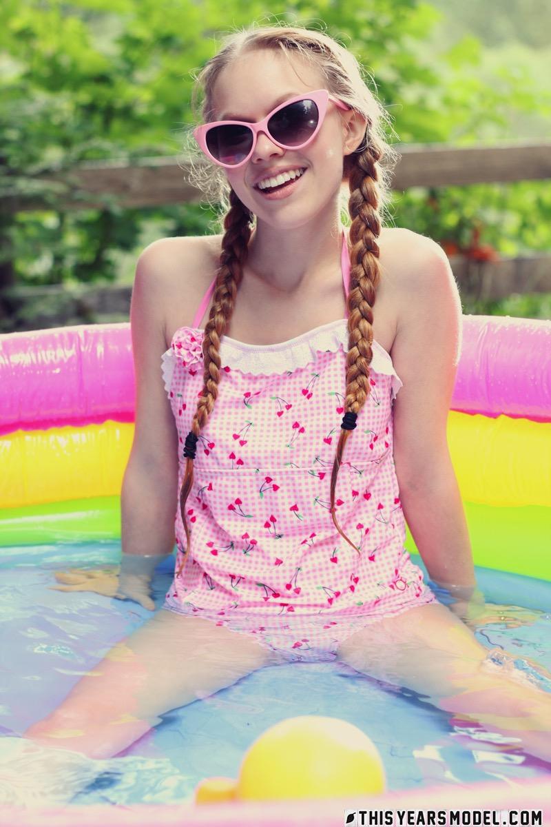 Cute Dolly Little in the garden pool - 1