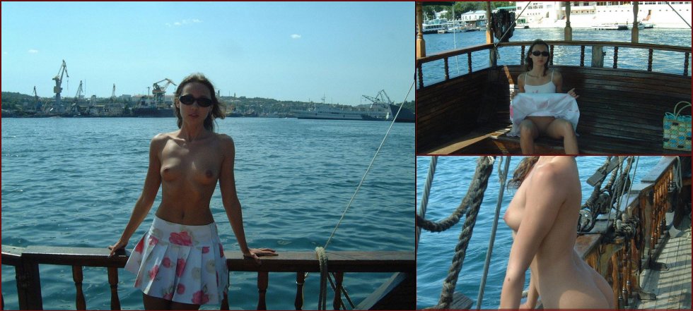 Young Julia is posing on the old boat. Part 1 - 1