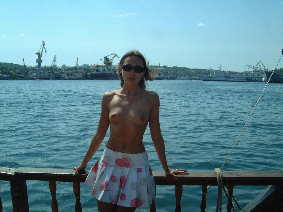 Young Julia is posing on the old boat. Part 1 - 1