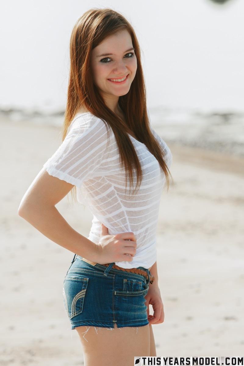 Red-haired Emily French on the beach - 2