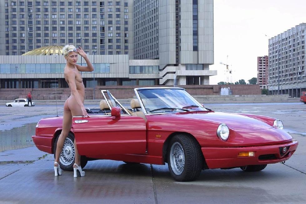 Naked blonde amateur in red car - 11