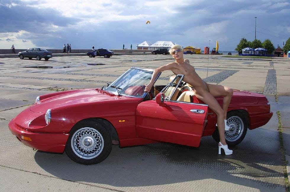 Naked blonde amateur in red car - 8