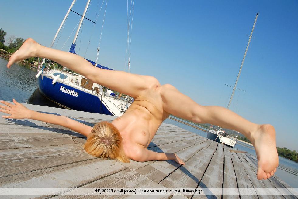 Young blonde is dancing naked on the pier - Addie - 10