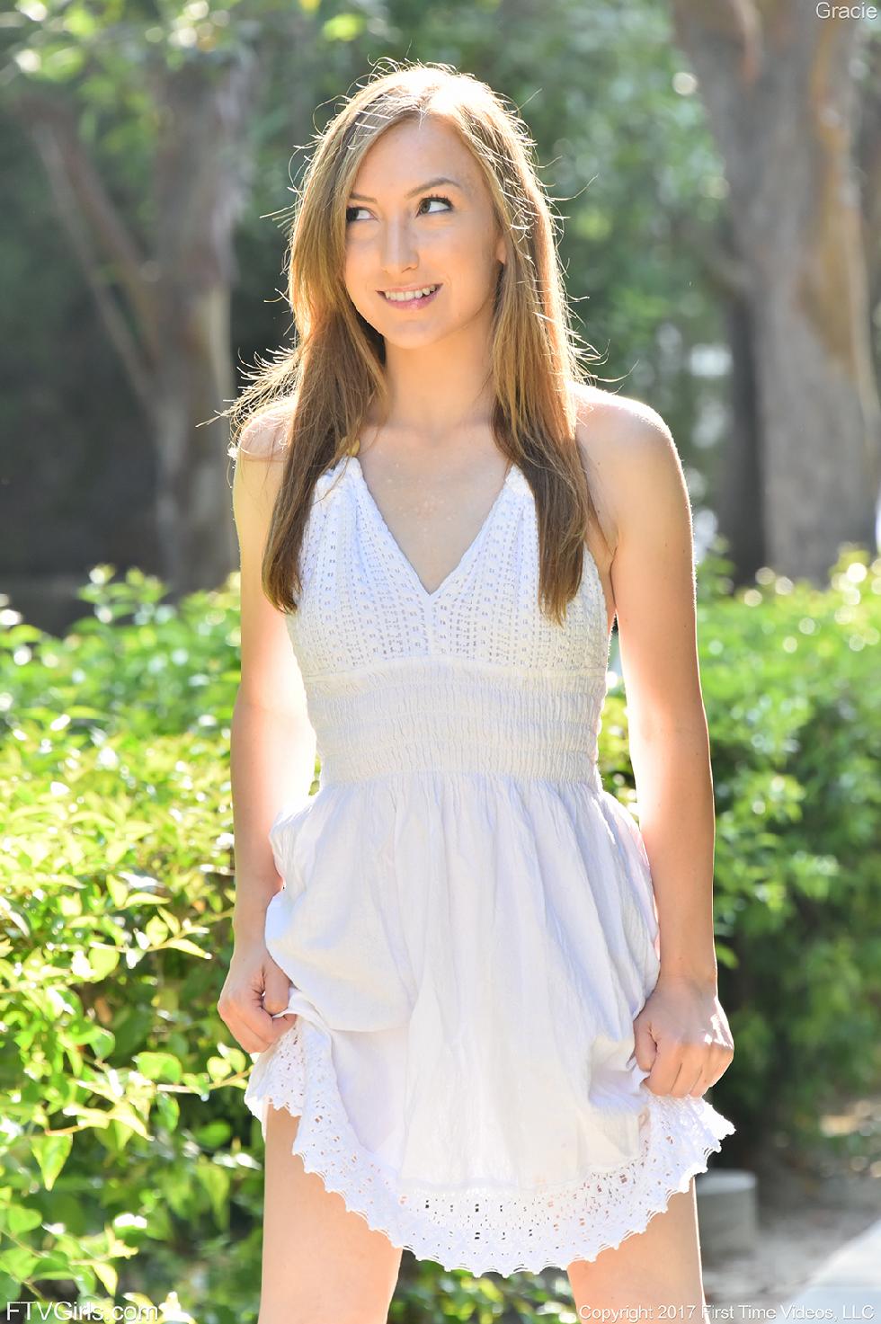 Gracie is taking off her clothes outdoor - 2