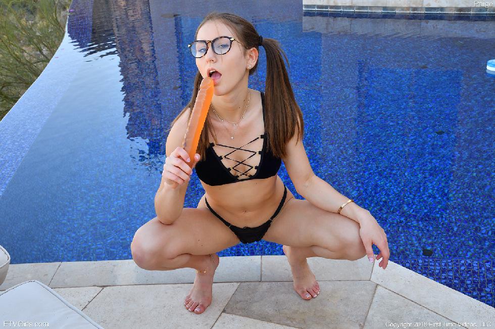 Cute Paige takes the toy deep in both holes